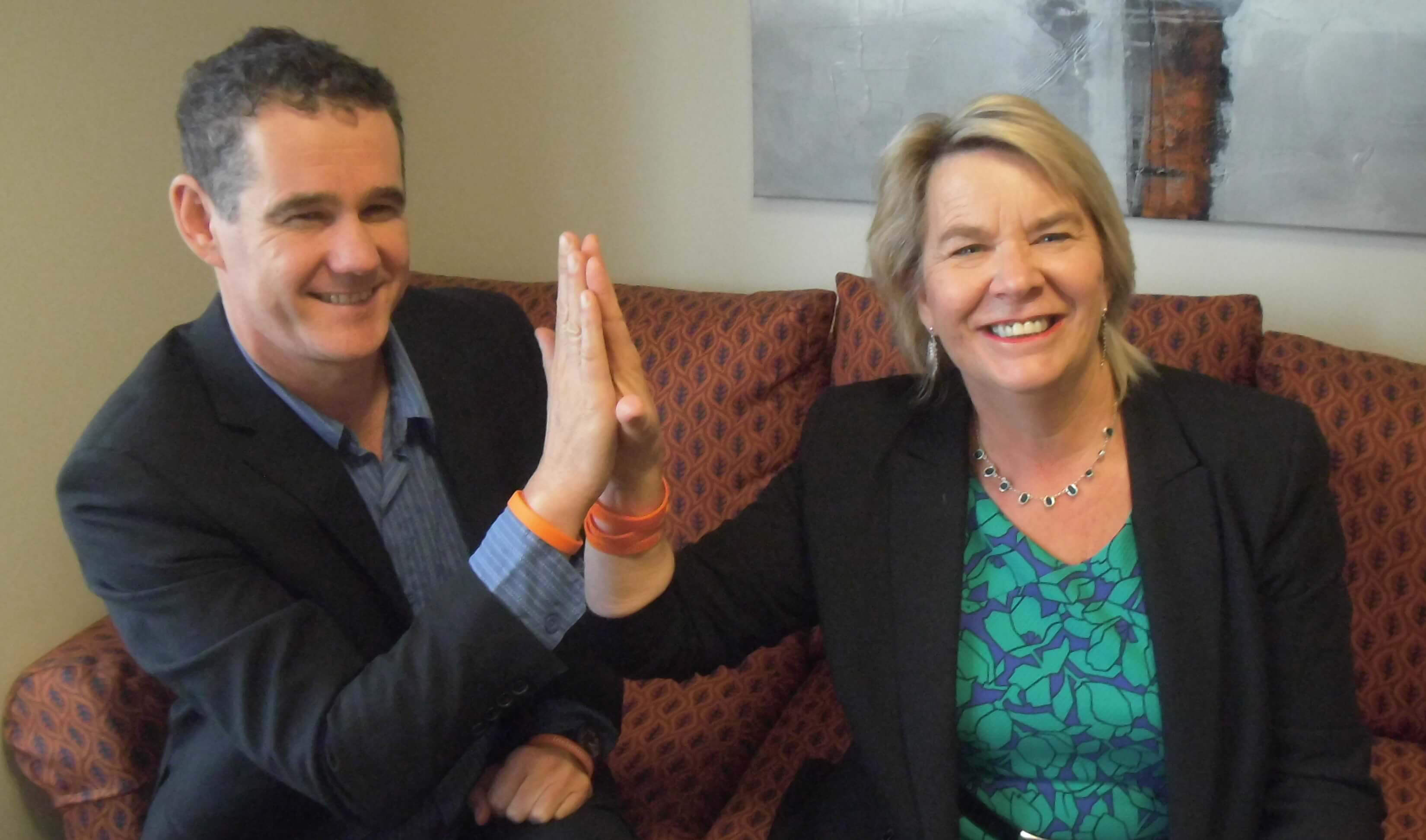 Photo of Disability Rights Commissioner, Paul Gibson with Minister for Disability Issues, Hon Nicky Wagner wearing 'Inclusion Matters' wristbands